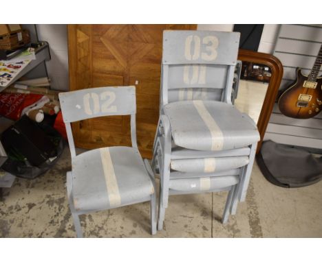 A set of four vintage childrens utility chairs having shabby chiq paint work