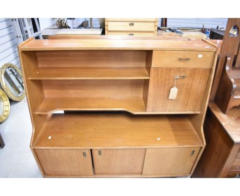 A vintage sapele sideboard unit of stylised design, probably 1960s