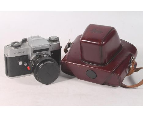 Leica Leicaflex SL camera body, serial number 1200386, fitted with Leitz Wetzlar Elmarit-R 1:2.8/35 lens #2252744, held in Le