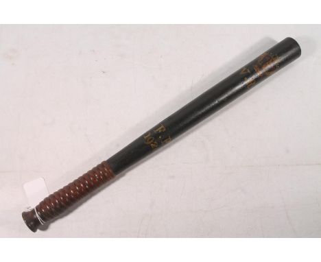 Victorian police truncheon, the black body painted with crowned VR cypher above 'FP 1926', turned ribbed grip, 46.5cm long.