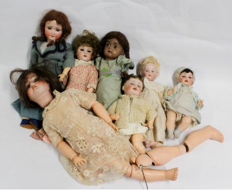 Simon and Halbig of Thuringia Germany, bisque headed dolls '1909 5 1/2' 55cm tall, '1906 13' 71cm tall, '1923 3' 46cm tall, '