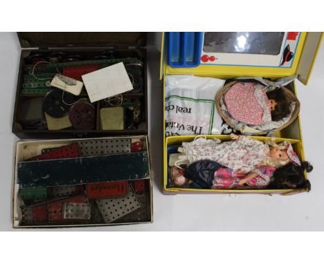 Sindy briefcase with two Sindy dolls and baby sister doll with some accessories, also two boxes of Meccano.
