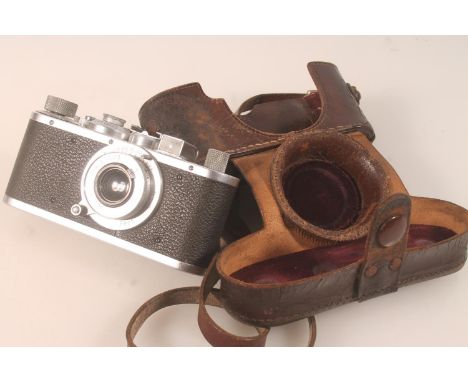 Ernest Leitz GMBH of Wetzlar Germany, a Leica 1938 type I camera, No:286678 fitted with Leitz Elmar 1:3.5 f=5cm, held in Leic