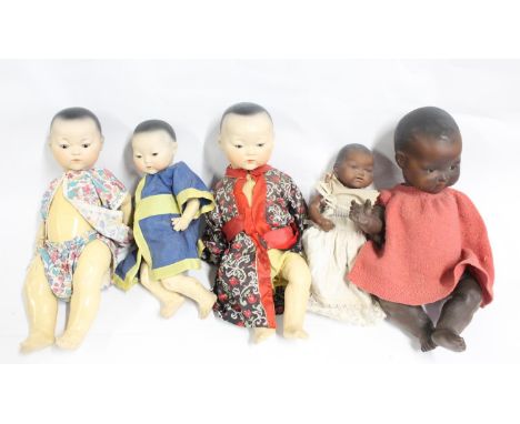 Armand Marseille of Kopplesdorf Germany, five bisque headed ethnic dolls to include a pair stamped 'AM Germany 353./4K', 42cm