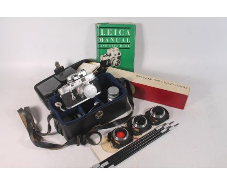 Leica M2 camera by Ernst Leitz GMBH of Wetzlar Germany, serial number 1069337 fitted with Leitz Wetzlar Summaron 1:2/50 lens,