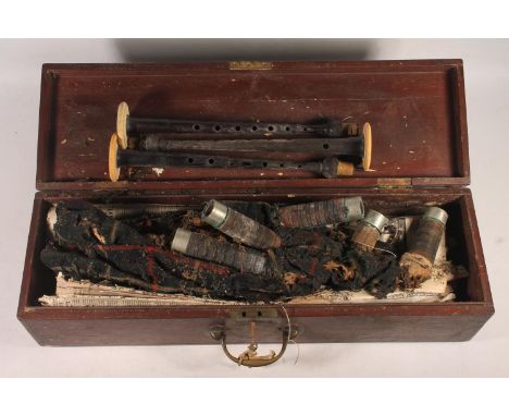 Set of Henderson of Glasgow bagpipes in a very poor state, held in mahogany hinge top box.  Ivory Exemption number: M5LLV7C2 