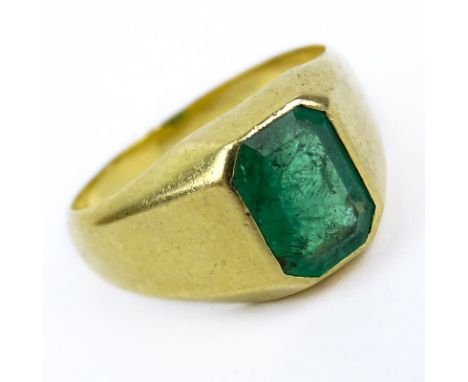 Man's Vintage Emerald and 18 Karat Yellow Gold Ring. Emerald with vivid saturation of color measures 10mm x 7mm. Unsigned. Su