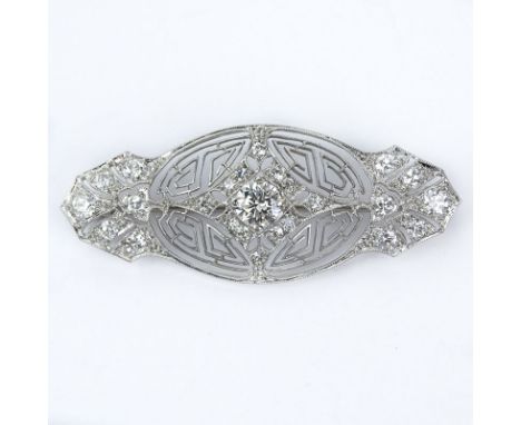 Vintage Approx. 1.50 Carat TW Round Cut Diamond and 14 Karat Filigree White Gold Brooch. Diamonds H-I color, VS1 clarity. Uns