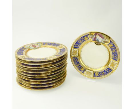 Twelve (12) Fine Hutschenreuther Early 20th Century Hand Painted Cabinet Plates. The rims cobalt blue ground with gold decora