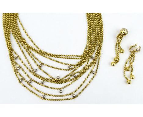 Circa 1999 Cartier Round Brilliant Cut Diamond and 18 Karat Yellow Gold Multi Strand Bead Necklace and Earring Suite. Signed 