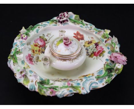 An English porcelain inkwell, probably Coalport, circa 1820-30, painted with three groups of flowers around a central inkwell