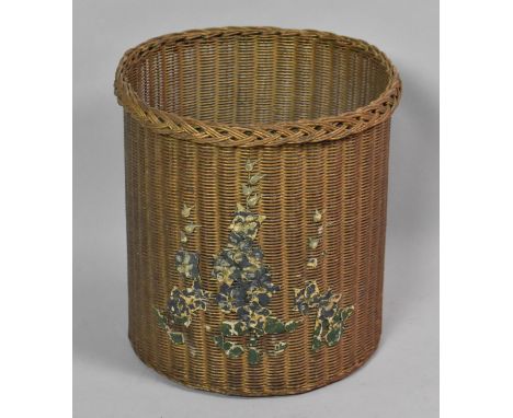 A Vintage Cylindrical Wicker Waste Basket with Floral Decoration, 30cm Diameter 