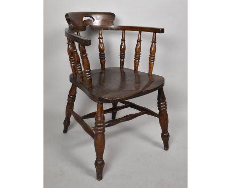 A Vintage Oak Smokers Bow Spindle Back Armchair 