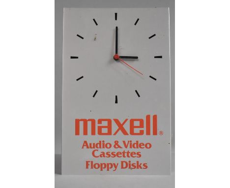 A Vintage Maxell Audio and Video Cassette, Floppy Discs  Advertising Clock, with Battery Movement, 35cm high 