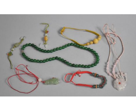 A Collection of Various Jade and Jadeite Pendants etc 