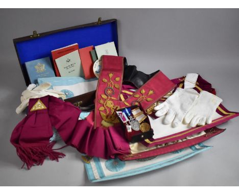 A Collection of Various Masonic Regalia and Ephemera to Include Jewels, Aprons, Books, Sash, Gloves all In Leather Case 