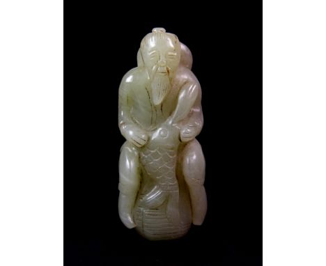 A 19th / early 20th century carved nephrite jade figure of a fisherman sitting on a basket, H. 8cm.