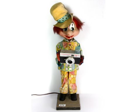 An electric automaton shop display model of a toy clown photographer, H. 59cm.