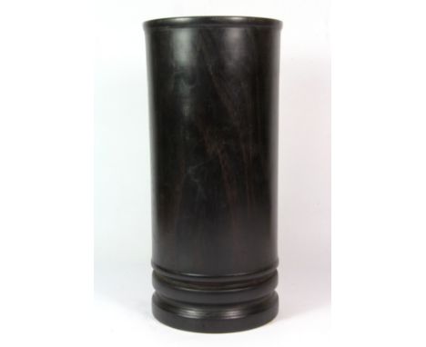 A tall Chinese dark hardwood scroll stand / brush pot, H. 32cm.