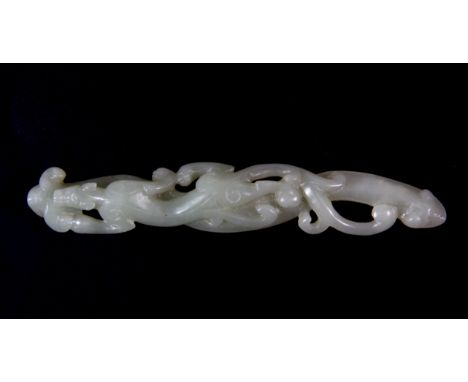 A 19th / early 20th century Chinese carved nephrite jade model of a dragon crawling along a branch carved as a ruyi, L. 12cm.