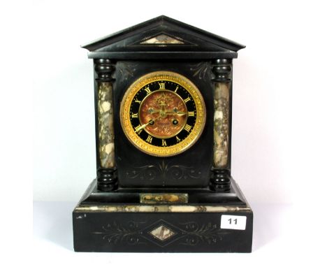 A 19th century French slate mantle clock, H. 36cm.