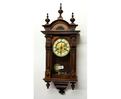 A Victorian mahogany striking wall clock, H. 70cm.