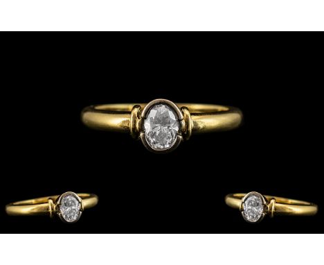 18ct Gold Superb Quality Pave Set Single Stone Diamond Ring of Excellent Contemporary Design. The Oval Shaped Faceted Diamond