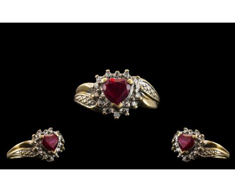 Ladies Attractive 9ct Two Tone Gold Heart Shaped Ruby Set Dress Ring. Full Hallmark for 9 ct - 375. Ruby of Good Colour. Ring