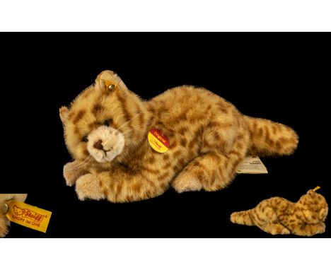 Steiff Ginger Kitten complete with Steiff button in ear and original labels, EAN 099489.  12" long x 6" high.  Very cute oran