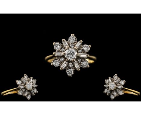 Art Deco Period 18ct Gold - Attractive Diamond Set Dress Ring. Marked 18ct. The Round Brilliant Cut and Baguette Cut Diamonds