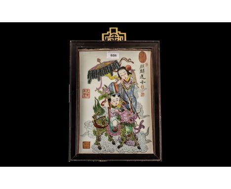 Chinese Famille Rose Decorated Porcelain Tile, depicting a small boy riding a Kylin Dog, with an escort carrying an umbrella.