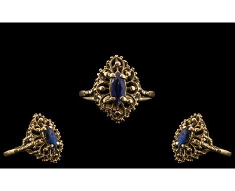 Ladies 9ct Gold - Attractive Single Stone Sapphire Set Dress Ring, With Excellent Open Worked Setting and Design. The Faceted