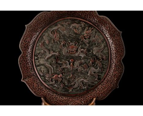 Qing Dynasty Cinnabar Lacquered Antique Imperial Chinese Quadrafoil form Shaped Dish of extremely fine quality. Depicting a 5