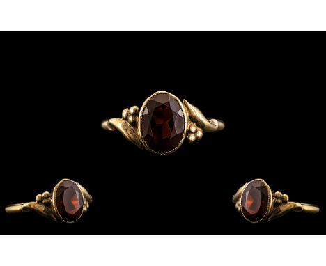 Antique Period 9ct Gold Single Stone Garnet Set Ring, Marked 9ct to Interior of Shank, The Oval Faceted Pave Set Garnet of Ab