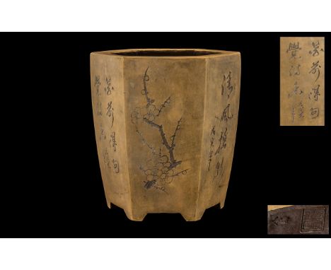 Chinese Brown Pottery Vase of Hexagonal Shape, with an incised decoration depicting bamboo and cherry trees amongst flowers, 