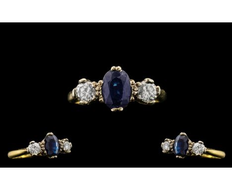 18ct Gold - Attractive 3 Stone Diamond and Sapphire Set Dress Ring. Full Hallmark for London 1953. The Two Round Brilliant Cu