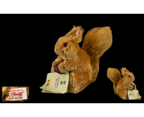 Steiff Beatrix Potter Squirrel Nutkin.  Squirrel Nutkin in reddish brown mohair, measures 15cm, EAN 354304. This adorable Bea