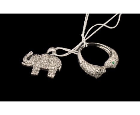 Leopard Head Torque Style Ring and Elephant Pendant, the ring having two detailed leopards heads, pave set with white, round 