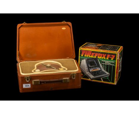 Vintage Boxed Radio housed in a brown case, together with boxed Grandstand Firefox F-7 3-D Effect Twin Speaker Sound, with in