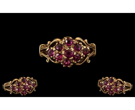 Ladies - 9ct Gold Attractive Ruby Set Cluster Ring with Fancy Setting. Full Hallmark for 9.375.  Ring Size O. The Setting and