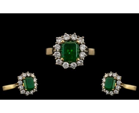 18ct Gold Attractive Emerald &amp; Diamond Set Ring marked 750 to interior of shank.  The central step-cut emerald of good co