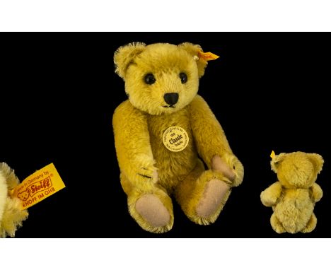 Steiff 1909 Classic Teddy Bear. 10" tall jointed golden blonde mohair Teddy Bear with Steiff button in ear and original label