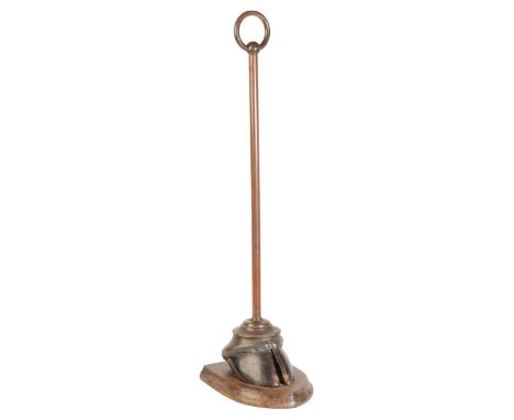 ARMY &amp; NAVY STORES, LONDON: A BRASS AND HOOF DOORSTOP with ivorine plaque "Mounted by Army &amp; Navy Stores, Naturalist 