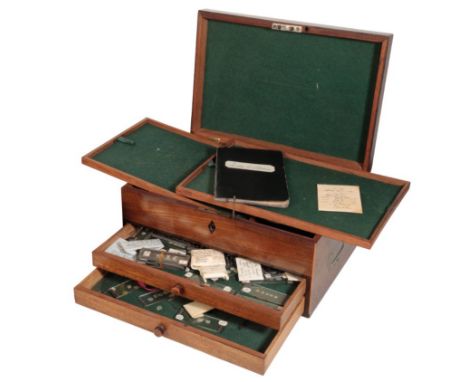 A VICTORIAN MAHOGANY BOX containing slides of salmon scales and sea trout scales, with an index booklet of weights and rivers