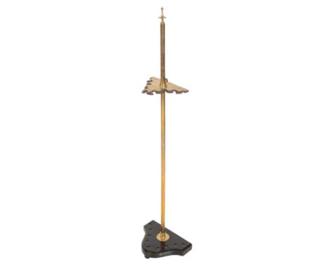 A VICTORIAN BRASS STAINED OAK COACHING WHIP RACK for nine carriage whips, with adjustable height, 118 cm highIllustrated in t
