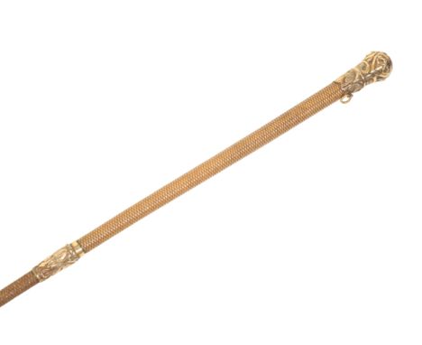 A VICTORIAN LADY'S SIDE SADDLE WHIP with gilt metal mount and silver-plated grip, 26cm long