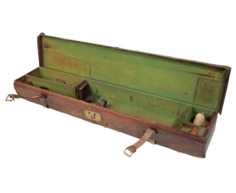 A VICTORIAN LEATHER SINGLE GUN CASE, a canvas and leather game bag;  an Amazing Scotch Duck Caller in original box; a 12 bore