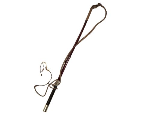 SWAINE &amp; ADENEY LTD, LONDON: A GIG WHIP with a hollow shaft, nickel silver and black plated handle, and leather thong, 61
