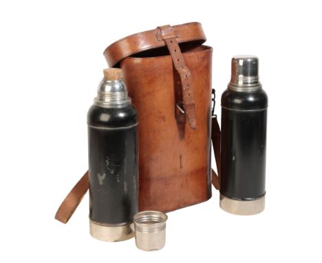 DREW &amp; SONS, PICCADILLY, LONDON: A THERMOS FLASK SET in leather carrying case with leather carrying strap (2 flasks and c