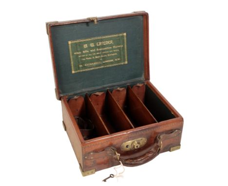 A LEATHER LIGHTWEIGHT CARTRIDGE MAGAZINE W.W. Greener, Gun, Rifle and Ammunition Maker, 68 Haymarket, London, with green leat